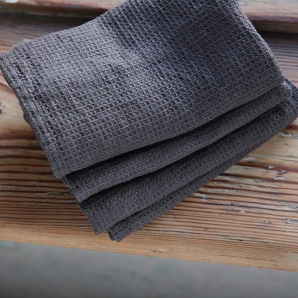 Stacked graphite waffle linen washcloths