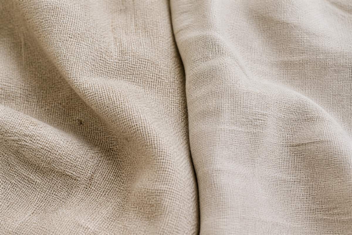 Close-up comparison of hemp and linen fabric textures