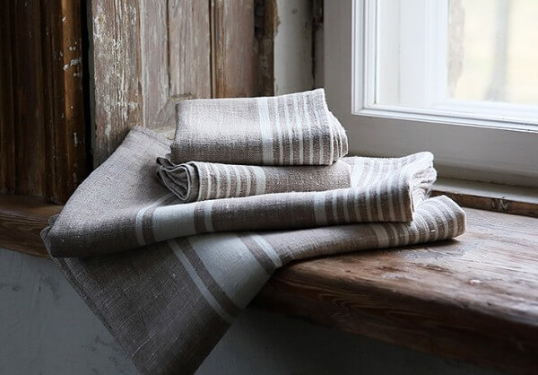 Linen towels prepared for visitors in a guest bathroom