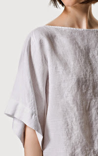 Loose light-coloured linen top with kimono-style sleeves