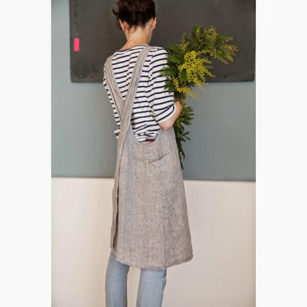 Cross-back apron made from softly washed grey linen