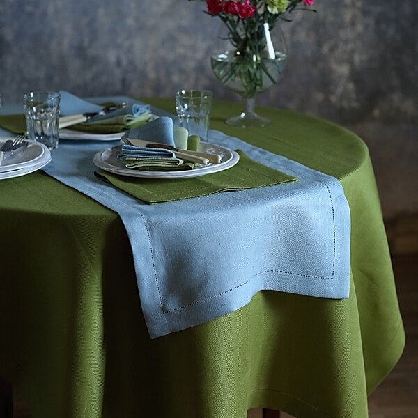 Natural linen tablecloth styled on a dining table