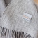 Close-up of soft grey merino wool fabric